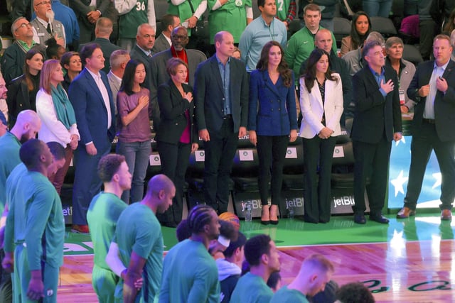 The royal couple stand for a rendition of the Star Spangled Banner as the Boston Celtics prepare to take on Miami Heat in their NBA showdown.