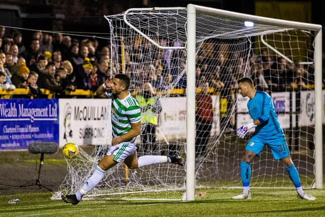 Celtic's Giorgous Giakoumakis celebrates putting his team 1-0 ahead.