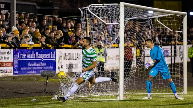 Celtic's Giorgous Giakoumakis celebrates putting his team 1-0 ahead.