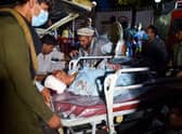Around 60 people wounded in the attack on Kabul airport on Thursday are being treated at a nearby surgical centre, according to Emergency, a charity that runs a network of war hospitals and first aid posts across Afghanistan.