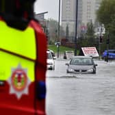 Cars are stuck in floodingin Rutherglen. Photo: John Devlin