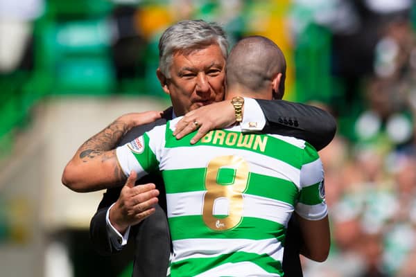 Celtic's Scott Brown embraces Chief Executive Peter Lawwell (left) after clinching the league title in 2018.