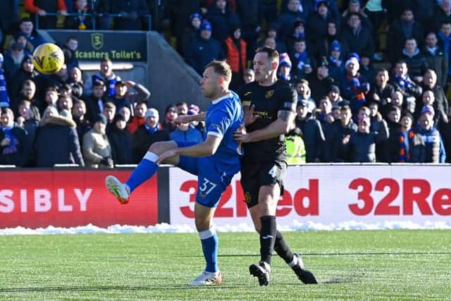 Scott Arfield lobs the ball home to open the scoring for Rangers at Livingston on Sunday afternoon. (Photo by Rob Casey / SNS Group)