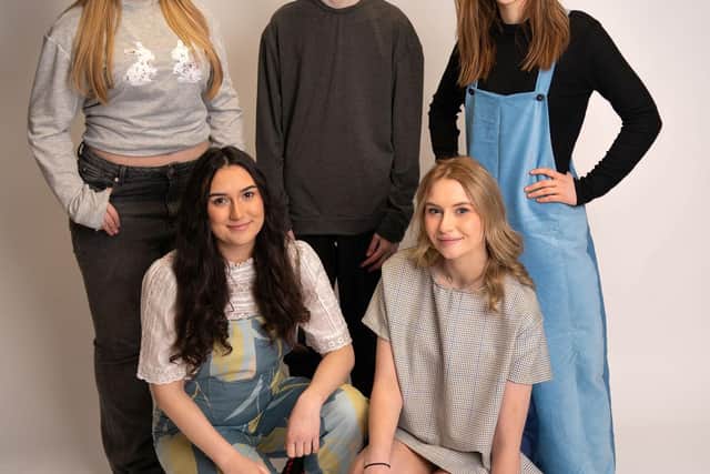 Learners Becky, Jay and Dani (back row) with models Amy Mackie and Eve Mackie (front row)