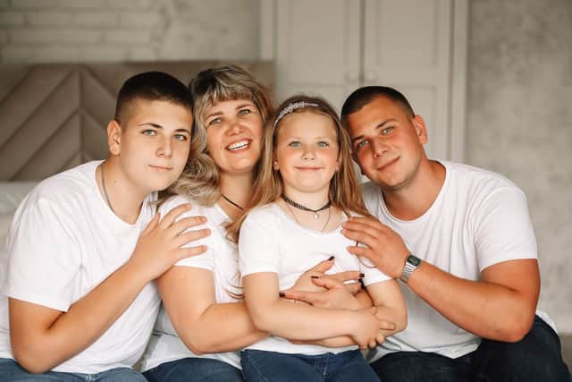 Liubov, with her children Oleksandr, 17, Sofia, 8 and Peter, who has remained in Ukraine with his father.