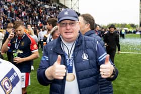 Falkirk manager John McGlynn celebrates following the 2-2 draw with Alloa Athletic that secured an unbeaten league campaign for the League One champions ahead of the trophy presentation. (Photo by Mark Scates / SNS Group)