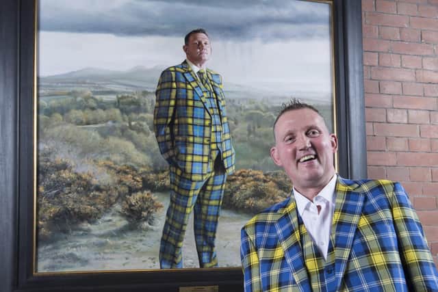 The late Doddie Weir with his portrait, by Gerard M Burns.