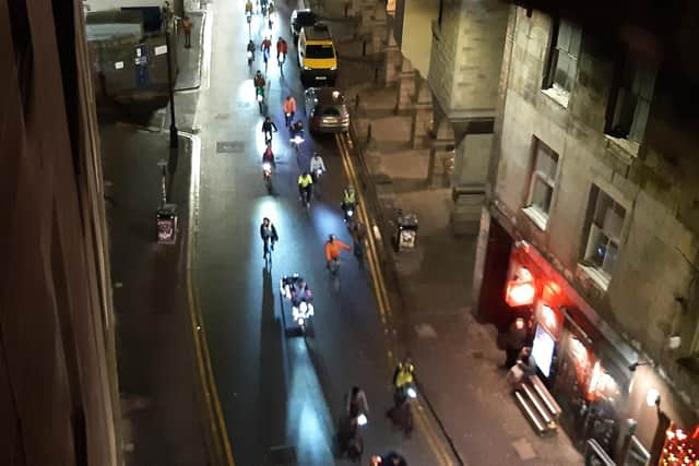 InfraSisters riders on Cowgate pass under George IV Bridge. (Photo by Alastair Dalton/The Scotsman)