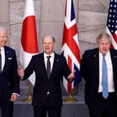 (L/R): Canada's Prime Minister Justin Trudeau, U.S. President Joe Biden, Germany's Chancellor Olaf Scholz and Britain's Prime Minister Boris Johnson pose for a G7 leaders' photo during a NATO summit at the alliance's headquarters in Brussels in March.