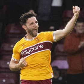 Motherwell's Ricki Lamie celebrates scoring against Hearts.