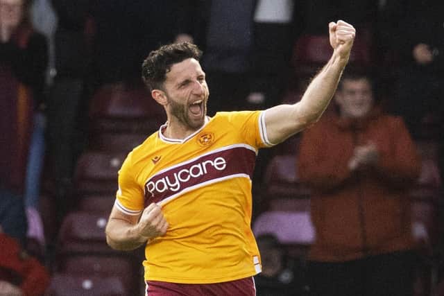 Motherwell's Ricki Lamie celebrates scoring against Hearts.