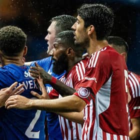 Rangers' Ianis Hagi argues with Olympiakos' Andreas Bouchalakis during a pre-season friendly at Ibrox.