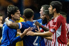 Rangers' Ianis Hagi argues with Olympiakos' Andreas Bouchalakis during a pre-season friendly at Ibrox.