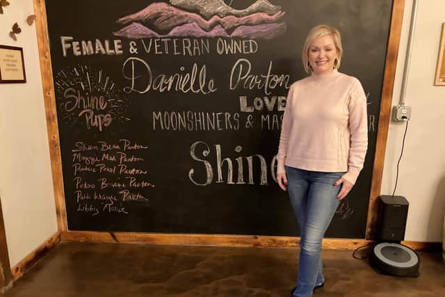 Danielle Parton, Dolly's niece, at Shine Girl moonshine distillery. Pic: Hannah Stephenson/PA.