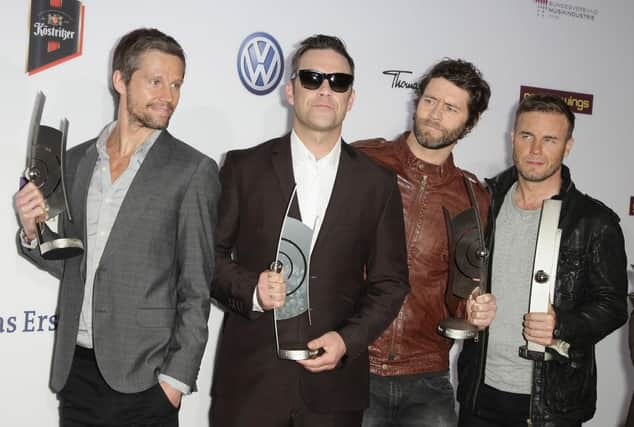 (L-R) Howard Donald, Robbie Williams, Mark Owen and Gary Barlow of Take That (Photo: Andreas Rentz/Getty Images)