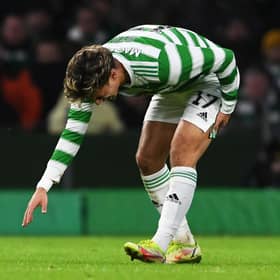 Celtic's Jota pulls up with a hamstring injury during the club's win over Hearts, during which Anthony Ralston and Stephen Welsh were also lost to hamstring and ankle issues, respectively. And Ange Postecoglou fears more losses over the December glut of games. (Photo by Craig Foy / SNS Group)