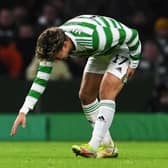 Celtic's Jota pulls up with a hamstring injury during the club's win over Hearts, during which Anthony Ralston and Stephen Welsh were also lost to hamstring and ankle issues, respectively. And Ange Postecoglou fears more losses over the December glut of games. (Photo by Craig Foy / SNS Group)