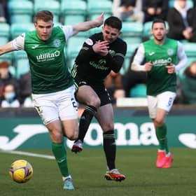 Hibs' Chris Cadden holds off Greg Taylor during the 0-0 draw with Celtic. (Photo by Alan Harvey / SNS Group)