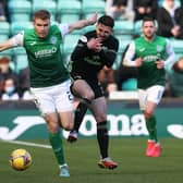 Hibs' Chris Cadden holds off Greg Taylor during the 0-0 draw with Celtic. (Photo by Alan Harvey / SNS Group)