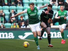 Hibs' Chris Cadden holds off Greg Taylor during the 0-0 draw with Celtic. (Photo by Alan Harvey / SNS Group)