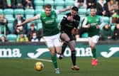 Hibs' Chris Cadden holds off Greg Taylor during the 0-0 draw with Celtic. (Photo by Alan Harvey / SNS Group)