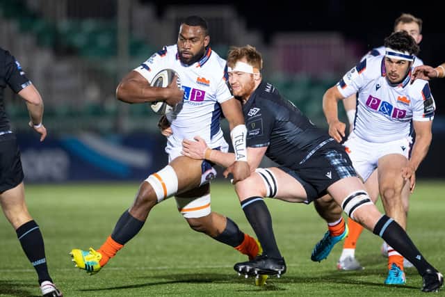 Glasgow's Rob Harley tackles Edinburgh's Mesu Kunavula during the Warriors' win at Scotstoun which secured the 1872 Cup. Picture: Ross Parker/SNS