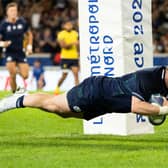 LILLE, FRANCE - SEPTEMBER 30: Scotland's Johnny Matthews scores a try during a Rugby World Cup match between Scotland and Romania at the Stade Pierre Mauroy, on September 30, 2023, in Lille, France. (Photo by Craig Williamson / SNS Group)