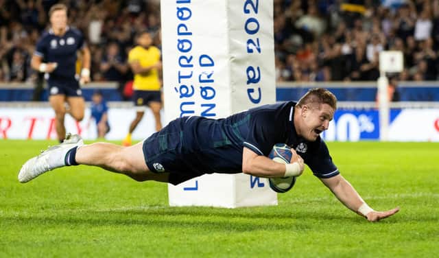 LILLE, FRANCE - SEPTEMBER 30: Scotland's Johnny Matthews scores a try during a Rugby World Cup match between Scotland and Romania at the Stade Pierre Mauroy, on September 30, 2023, in Lille, France. (Photo by Craig Williamson / SNS Group)