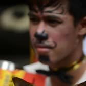 An animal rights advocate in a Manila protest against fireworks (Picture: Getty)