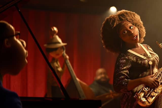 Joe Gardner, voiced by Jamie Foxx, left, and Dorothea Williams, voiced by Angela Bassett, in a scene from Soul. PIC: Disney Pixar via AP