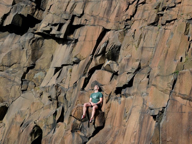 Rock climbers takes a break on the crags.