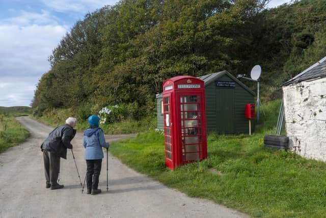 Islanders on Canna in the inner Hebrides have been running a campaign to get their beloved red phone box repaired. Using social media and a poster on the box itself they have been asking people to report the phone to BT. After two years, they are now close to getting an engineer to visit the island. PIC: Andrew O'Brien.