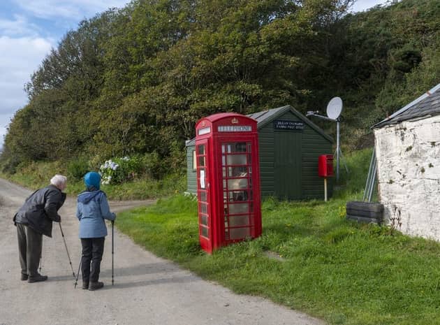 Islanders on Canna in the inner Hebrides have been running a campaign to get their beloved red phone box repaired. Using social media and a poster on the box itself they have been asking people to report the phone to BT. After two years, they are now close to getting an engineer to visit the island. PIC: Andrew O'Brien.