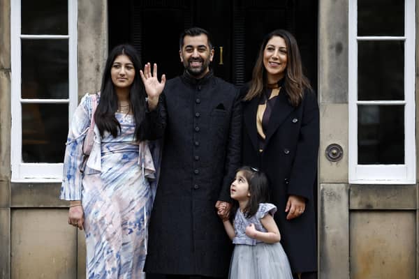 New First Minister Humza Yousaf poses with his wife, Nadia El-Nakla, step-daughter Maya, left, and daughter Amal at Bute House (Picture: Jeff J Mitchell/Getty Images)