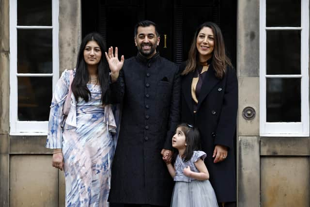 New First Minister Humza Yousaf poses with his wife, Nadia El-Nakla, step-daughter Maya, left, and daughter Amal at Bute House (Picture: Jeff J Mitchell/Getty Images)