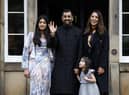 New First Minister Humza Yousaf poses with his wife, Nadia El-Nakla, step-daughter Maya, left, and daughter Amal at Bute House (Picture: Jeff J Mitchell/Getty Images)