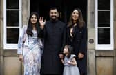 New First Minister Humza Yousaf poses with his wife, Nadia El-Nakla, step-daughter Maya, left, and daughter Amal at Bute House (Picture: Jeff J Mitchell/Getty Images)