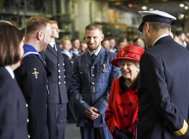 Queen Elizabeth II during a visit to HMS Queen Elizabeth at HM Naval Base, Portsmouth, ahead of the ship's maiden deployment. The visit comes as HMS Queen Elizabeth prepares to lead the UK Carrier Strike Group on a 28-week operational deployment travelling over 26,000 nautical miles from the Mediterranean to the Philippine Sea.