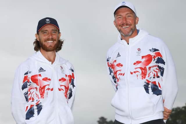 Tommy Fleetwood and his caddie Ian Finnis pose for a photo to mark the official announcement of the Team GB golf team for the Tokyo 2020 Olympic Games. Picture: Andrew Redington/Getty Images for British Olympic Association.