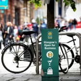 A sign reads "Glasgow's Open for Business" in Glasgow city centre. Picture: Jane Barlow/PA Wire