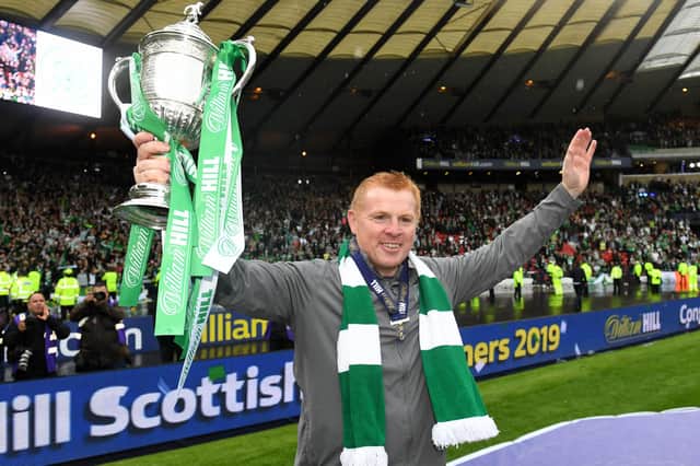 Celtic manager Neil Lennon holds the Scottish Cup aloft after the club completed the treble treble with the 2019 final win over Sunday's opponents' Hearts. (Photo by SNSGroup/Alan Harvey)