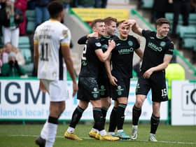Kyle Magennis (centre) celebrates after putting Hibs 3-0 ahead over Livingston at Easter Road. (Photo by Paul Devlin / SNS Group)