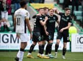 Kyle Magennis (centre) celebrates after putting Hibs 3-0 ahead over Livingston at Easter Road. (Photo by Paul Devlin / SNS Group)