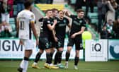 Kyle Magennis (centre) celebrates after putting Hibs 3-0 ahead over Livingston at Easter Road. (Photo by Paul Devlin / SNS Group)