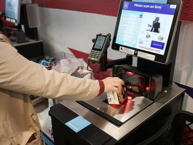 Self-checkouts can be handy but they're denying someone a job and governments the taxes that would come with same (Picture: Getty)