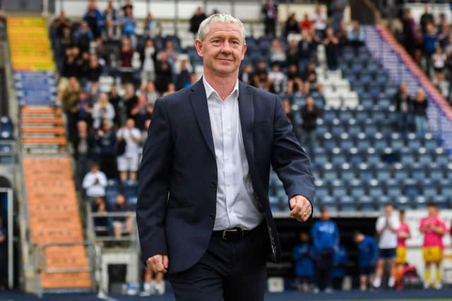 Kevin McAllister is welcomed onto the pitch pre-match ahead of the opening of his stand. (Photo by Craig Foy / SNS Group)