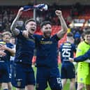 Dundee's Jordan McGhee (L) and Ricki Lamie celebrate securing top six at Pittodrie.