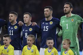 Scott McKenna joins Craig Gordon on the sidelines after fracturing his collarbone playing for Nottingham Forest.  (Photo by Craig Williamson / SNS Group)