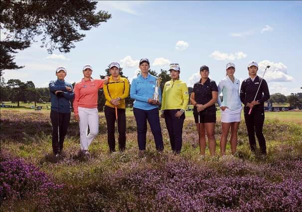 Defending champion Ashleigh Buhai, centre, with Jiyai Shin, Steph Kyriacou, Atthaya Thitikul, Kokona Sakuri, Lauren Coughlin, Linn Grant and Yu Liu at a photo shoot at Walton Heath for this week's AIG Women’s Open. Picture: The R&A.