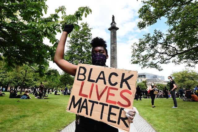 A Black Lives Matter protest at Melville Monument that holds the statue of Henry Dundas